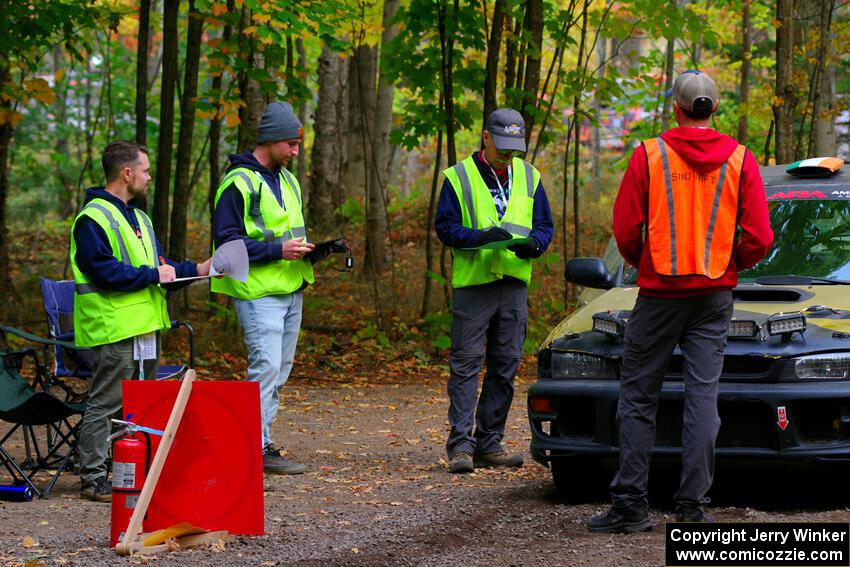 The start crew and Sean Costello / Steve Blomquist-Scanlan Subaru Impreza 2.5RS prepares for the start of SS16, Mount Marquette.