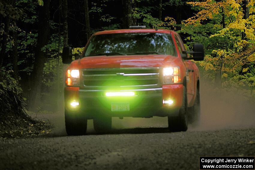 A Chevy Silverado sweeps SS16, Mount Marquette in preparation to re-start the stage.