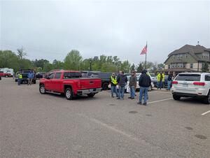 Stage crews gather in the parking lot before the event.