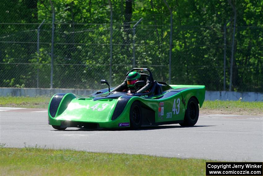Greg Eick's Spec Racer Ford 3 spins at turn 8.