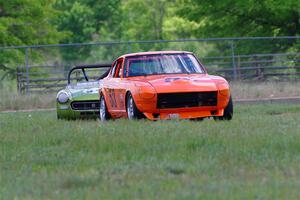 Tim Homes' Datsun 240Z and Dan L'Heureux's MG Midget