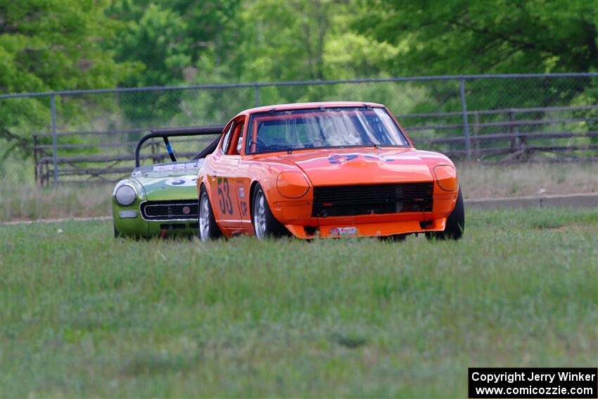 Tim Homes' Datsun 240Z and Dan L'Heureux's MG Midget