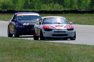 Nolan Elder's STL Mazda Miata and Bill Collins' STL Honda Civic