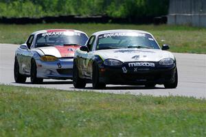 Samantha Silver's and Kyle Greenhill's Spec Miata Mazda Miatas