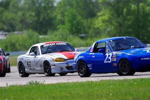 George Ellis' and Kyle Greenhill's Spec Miata Mazda Miatas