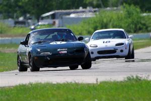 Sam Nogosek's Spec Miata Mazda Miata and Mark Carter's SMX Mazda Miata