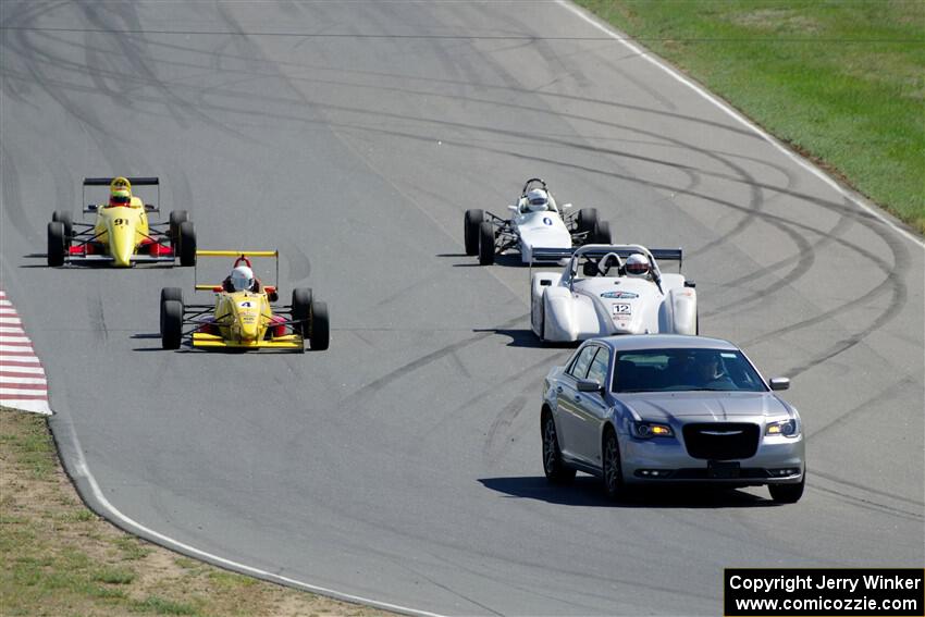 The Formula and Sports Racer group comes through turn 6 on the pace lap.