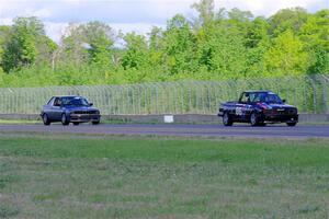 Jessica Johnk's BMW 325i leads  Jeff Johnk's BMW 325i