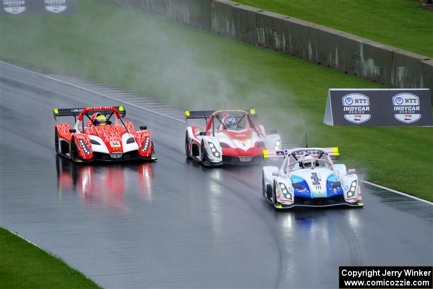 Louis Schriber's Radical SR10 XXR, Chip Romer's Radical SR10 XXR and Clint Field's Radical SR10