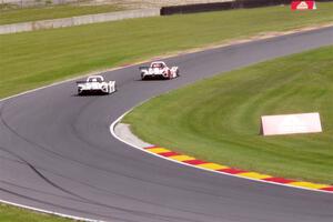 Two Radical SR3 XXRs exit the carousel.