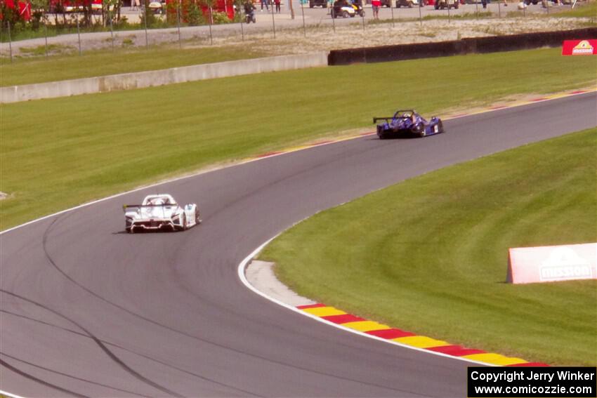 Spencer Schmidt's Radical SR3 XXR 1500 and ???'s Radical SR3 XXR 1340