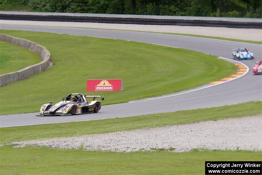 Suellio Almeida's Radical SR3 XXR 1340 and two other cars.