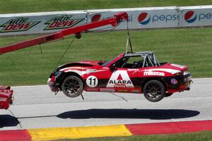 Ara Malkhassian's Mazda MX-5 Cup goes off on the hook.