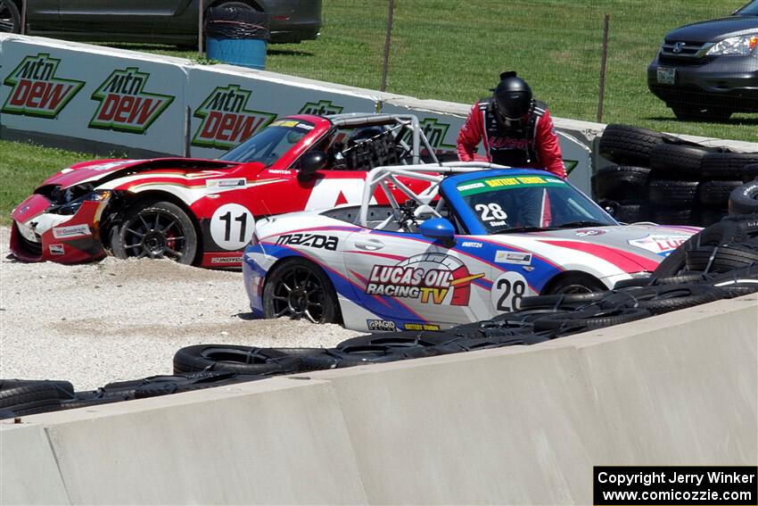 Robert Stout's and Ara Malkhassian's Mazda MX-5 Cups crash out at turn 7.