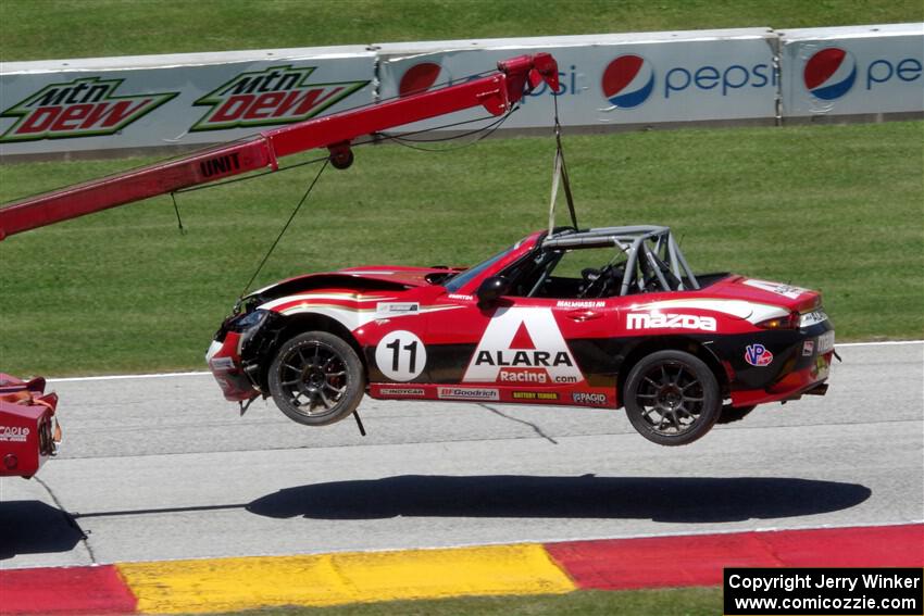 Ara Malkhassian's Mazda MX-5 Cup goes off on the hook.