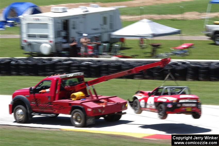 Ara Malkhassian's Mazda MX-5 Cup goes off on the hook.