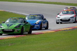 Hernan Palermo's, Keith Jensen's, Brian Henderson's and Nicholas Evancich's Mazda MX-5 Cups