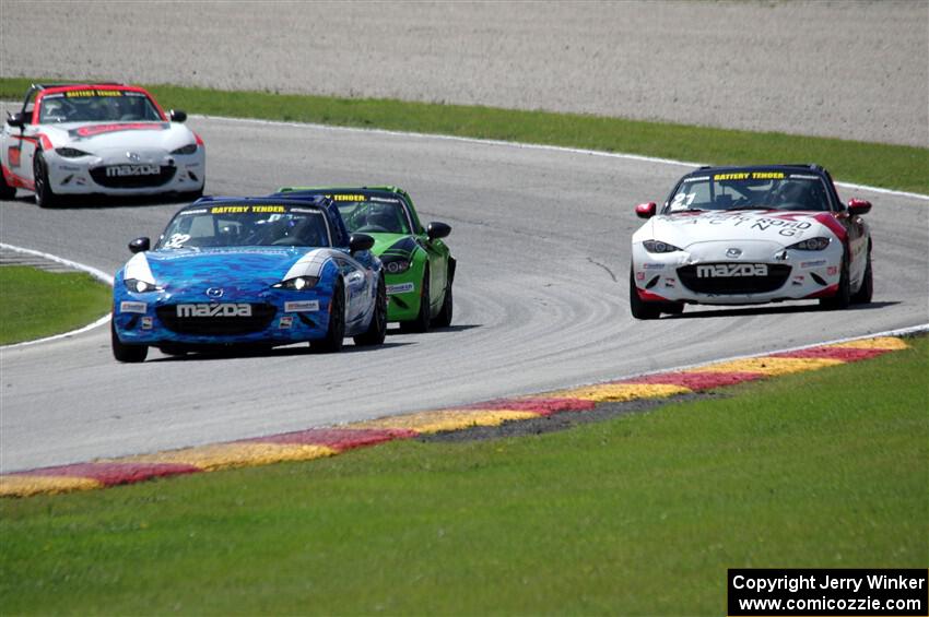 Keith Jensen's, Hernan Palermo's, Tom Martin, III's, Brian Henderson's and Nicholas Evancich's Mazda MX-5 Cups