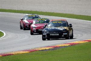 Mark Drennan's, Bryan Ortiz's, Nathanial Sparks' and Matt Cresci's Mazda MX-5 Cups
