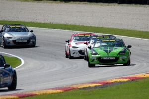 Hernan Palermo's, Tom Martin, III's, Brian Henderson's and Nicholas Evancich's Mazda MX-5 Cups