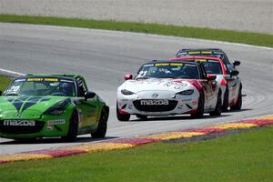 Hernan Palermo's, Tom Martin, III's, Brian Henderson's and Nicholas Evancich's Mazda MX-5 Cups