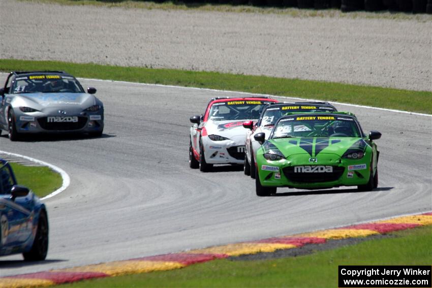 Hernan Palermo's, Tom Martin, III's, Brian Henderson's and Nicholas Evancich's Mazda MX-5 Cups