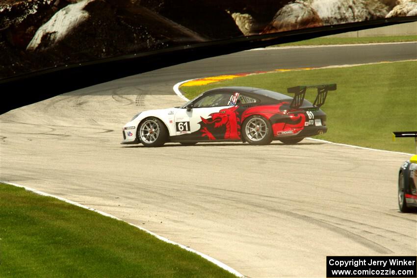 Scott Welham's Porsche GT3 Cup spins at turn 8.