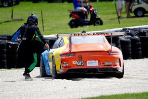 Tom Balames' Porsche GT3 Cup is stuck in the gravel trap at turn 14 on the final lap.