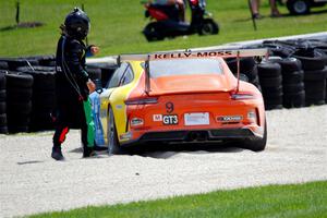 Tom Balames' Porsche GT3 Cup is stuck in the gravel trap at turn 14 on the final lap.