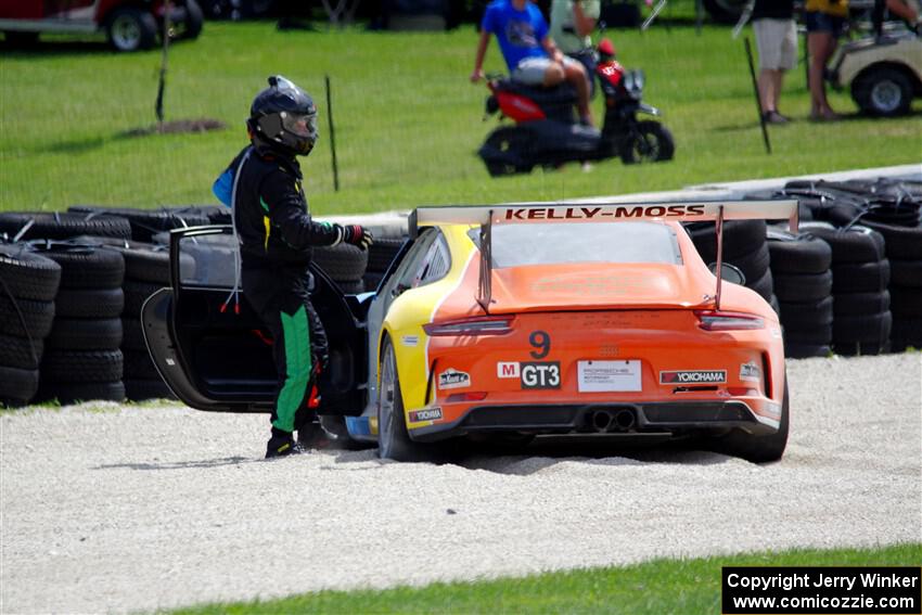 Tom Balames' Porsche GT3 Cup is stuck in the gravel trap at turn 14 on the final lap.