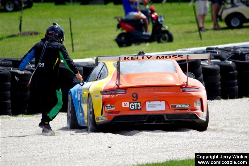 Tom Balames' Porsche GT3 Cup is stuck in the gravel trap at turn 14 on the final lap.