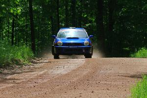 Jimmy Pelizzari / Bryce Proseus Subaru WRX on SS1, Camp 3 North.