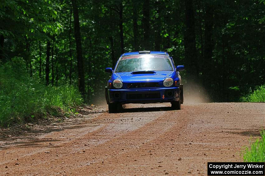 Jimmy Pelizzari / Bryce Proseus Subaru WRX on SS1, Camp 3 North.