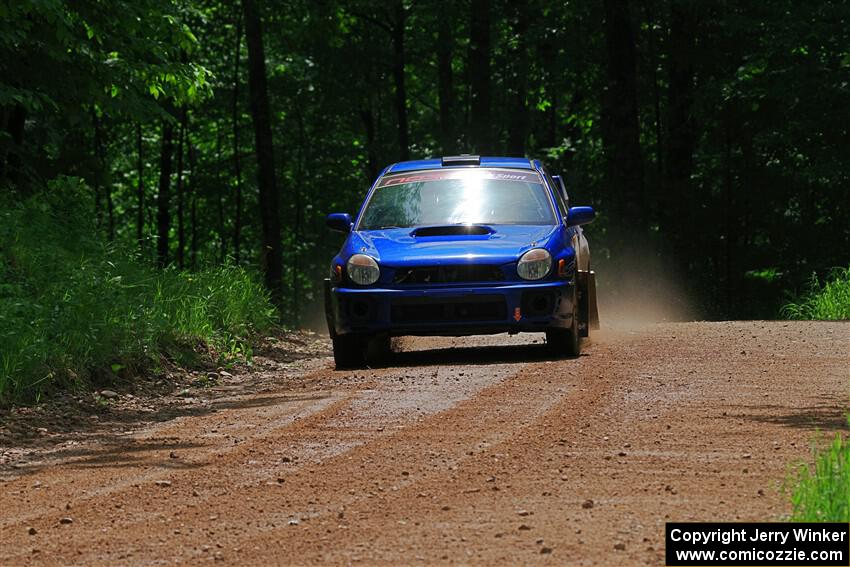 Jimmy Pelizzari / Bryce Proseus Subaru WRX on SS1, Camp 3 North.