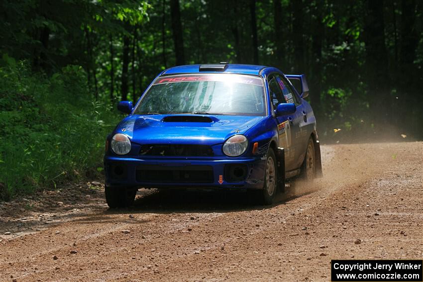 Jimmy Pelizzari / Bryce Proseus Subaru WRX on SS1, Camp 3 North.
