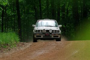 Shanti Witt / Keegan Helwig BMW 325is on SS1, Camp 3 North.