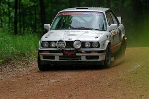 Shanti Witt / Keegan Helwig BMW 325is on SS1, Camp 3 North.