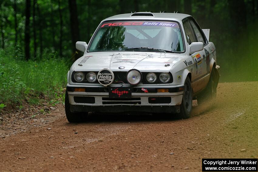 Shanti Witt / Keegan Helwig BMW 325is on SS1, Camp 3 North.