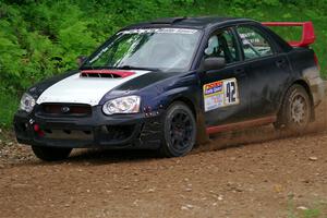 Mike Ryan's Subaru Impreza 2.5RS on SS1, Camp 3 North.