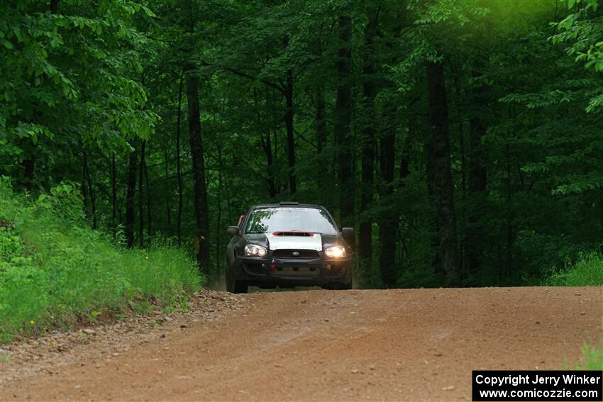 Mike Ryan's Subaru Impreza 2.5RS on SS1, Camp 3 North.