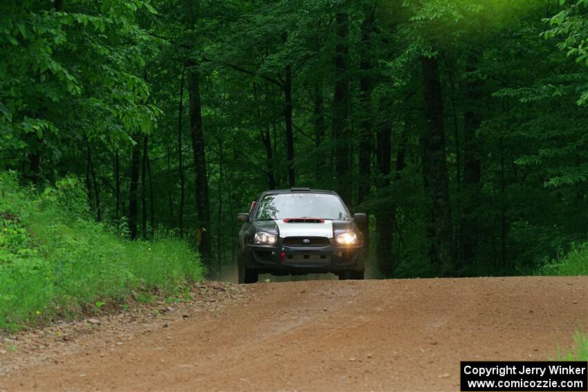 Mike Ryan's Subaru Impreza 2.5RS on SS1, Camp 3 North.