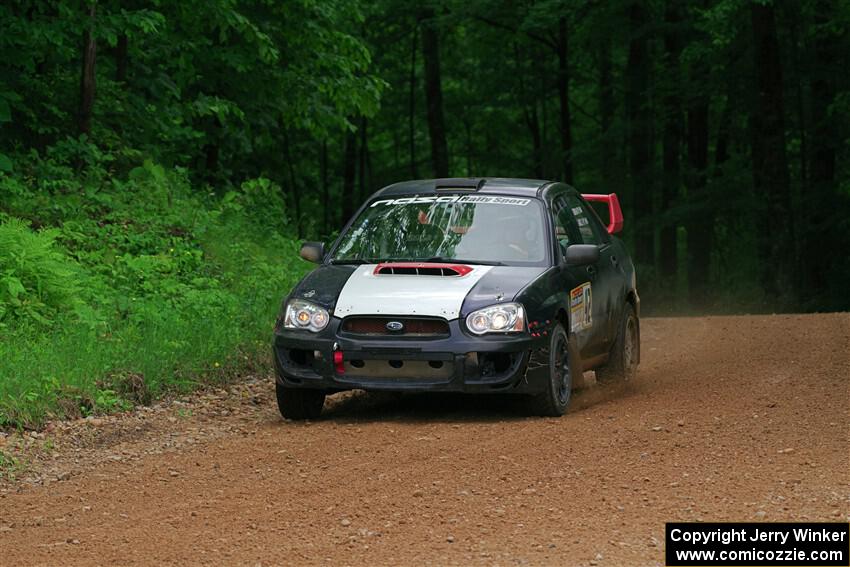 Mike Ryan's Subaru Impreza 2.5RS on SS1, Camp 3 North.