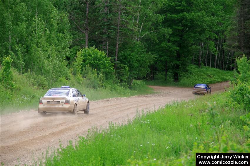 Tim Michel / Alex Ferencz Audi A4 Quattro chases Jimmy Pelizzari / Bryce Proseus Subaru WRX on SS3, Woodtick Hollow.