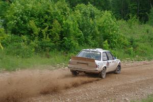 Shanti Witt / Keegan Helwig BMW 325is on SS3, Woodtick Hollow.