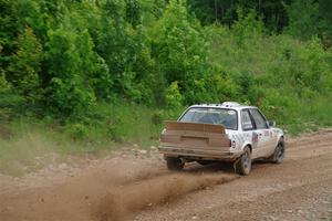 Shanti Witt / Keegan Helwig BMW 325is on SS3, Woodtick Hollow.