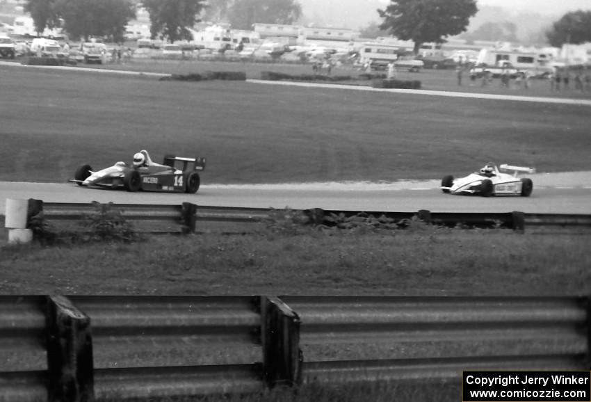 Pete Halsmer's Ralt RT-5/80 is chased by Al Unser, Jr.'s Ralt RT-5/81