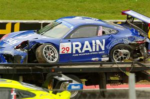 Jeffrey Majkrzak's Porsche GT3 Cup goes past on the flatbed.