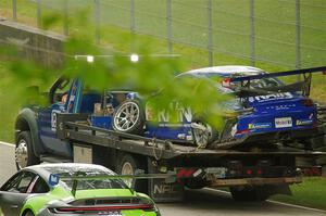 Jeffrey Majkrzak's Porsche GT3 Cup goes past on the flatbed.