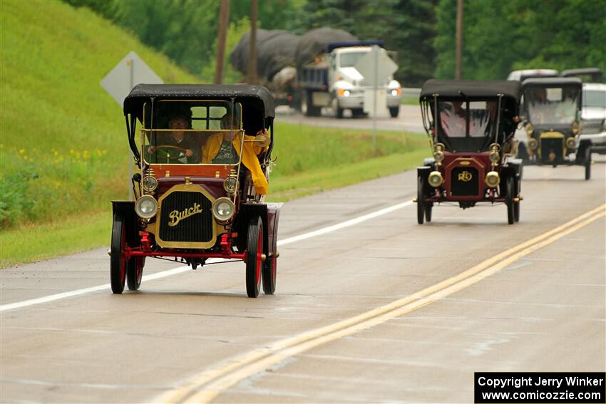Pat Hanggi's 1909 Buick and John Guehl's 1907 REO