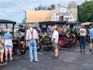John Guehl's 1907 REO, Richard Anderson's 1906 Maxwell and Pat Hanggi's 1909 Buick